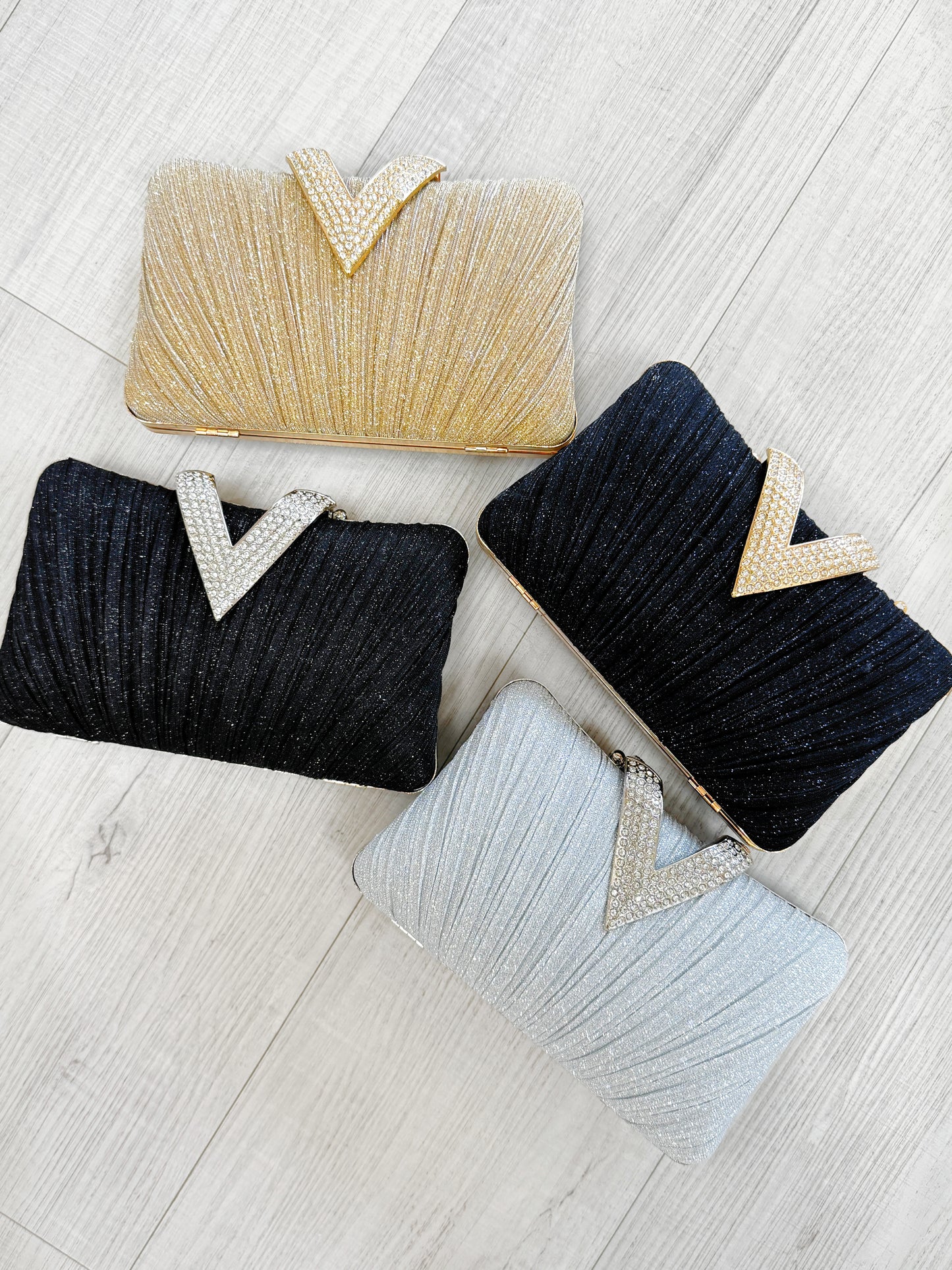V Buckle Clutch